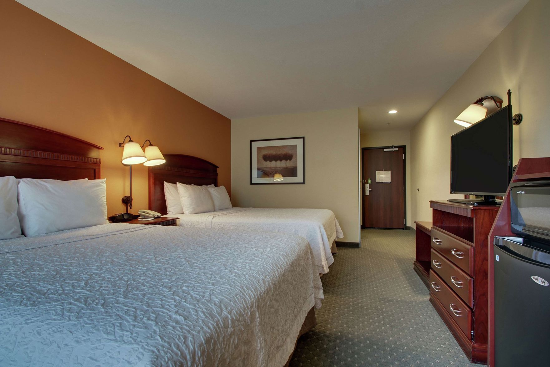 Hypo-allergenic bedding, pillowtop beds, desk, laptop workspace