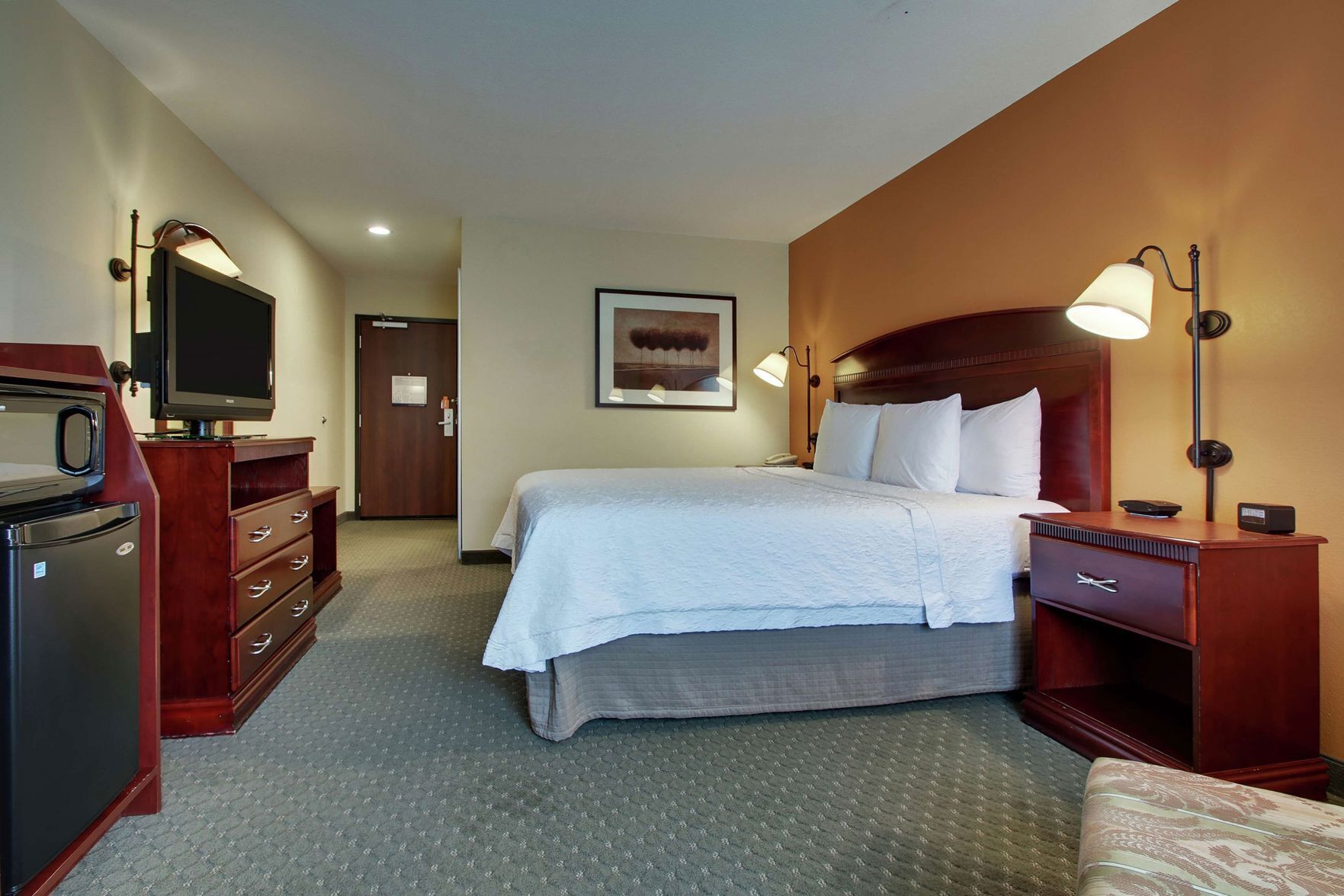 Hypo-allergenic bedding, pillowtop beds, desk, laptop workspace