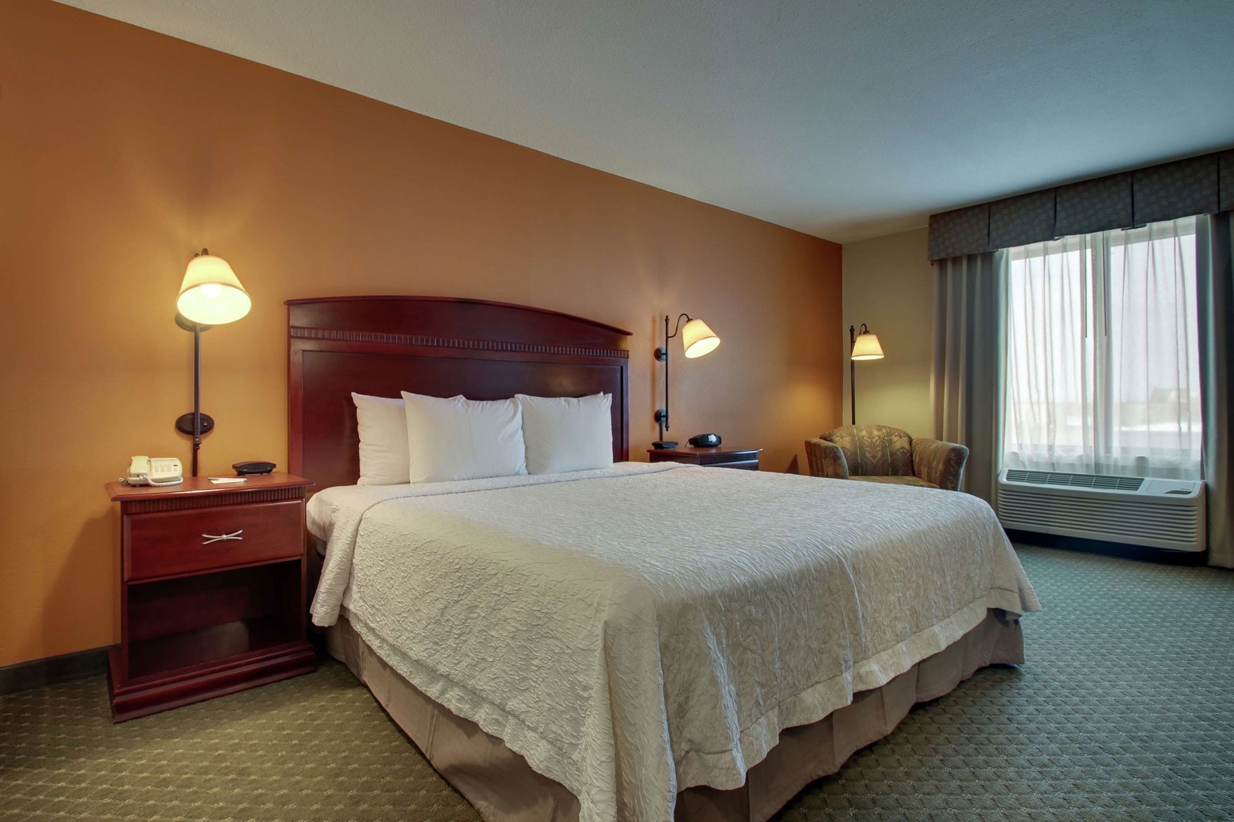 Hypo-allergenic bedding, pillowtop beds, desk, laptop workspace