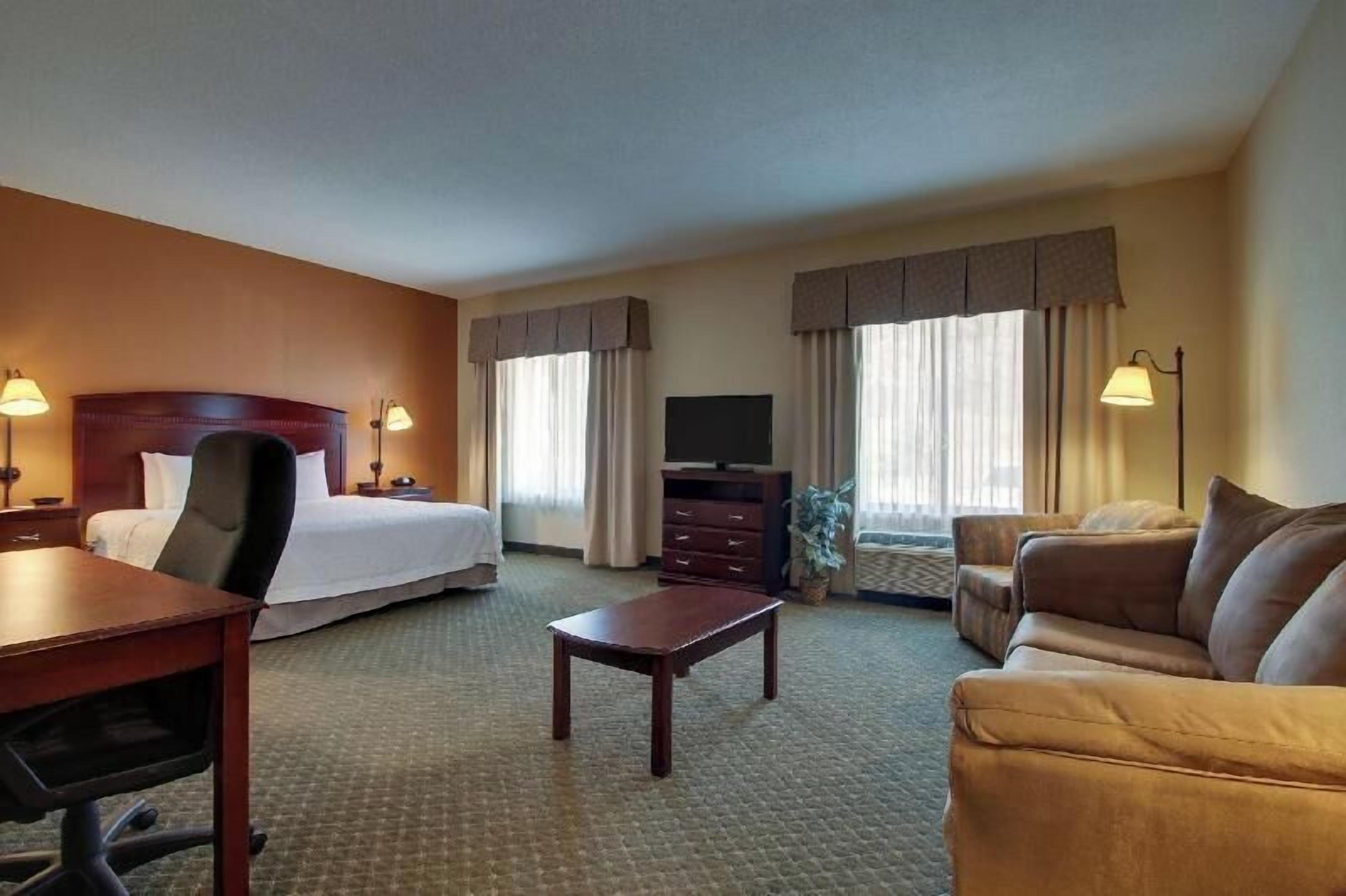 Hypo-allergenic bedding, pillowtop beds, desk, laptop workspace