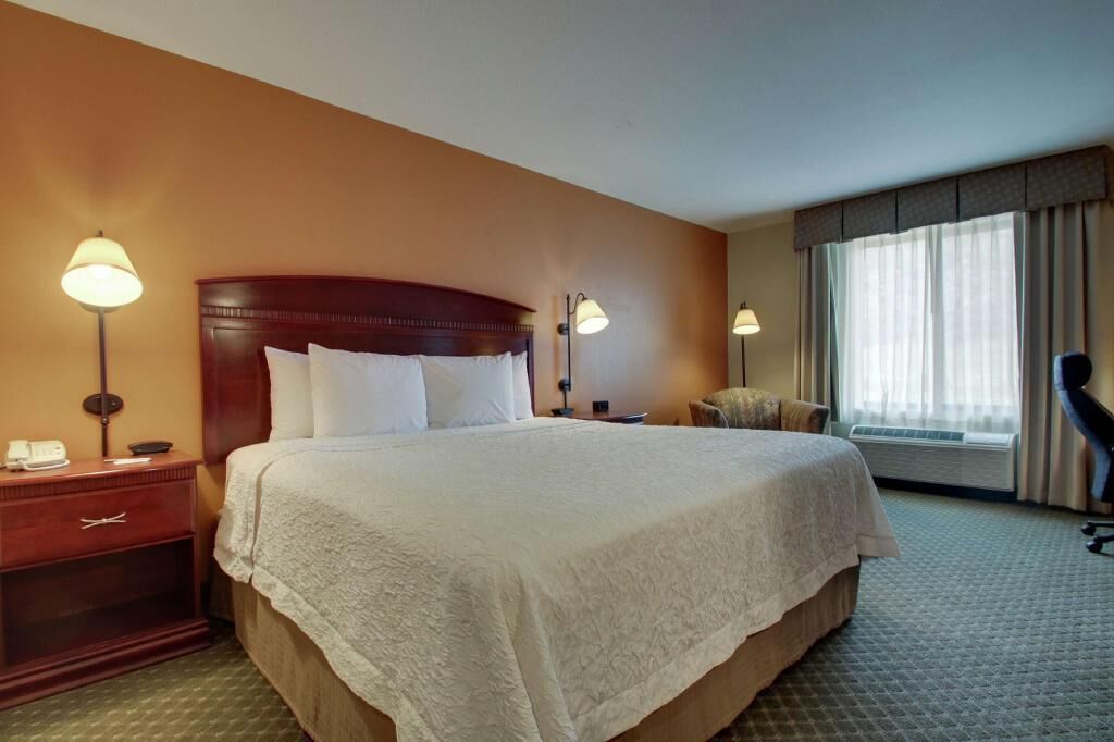 Hypo-allergenic bedding, pillowtop beds, desk, laptop workspace