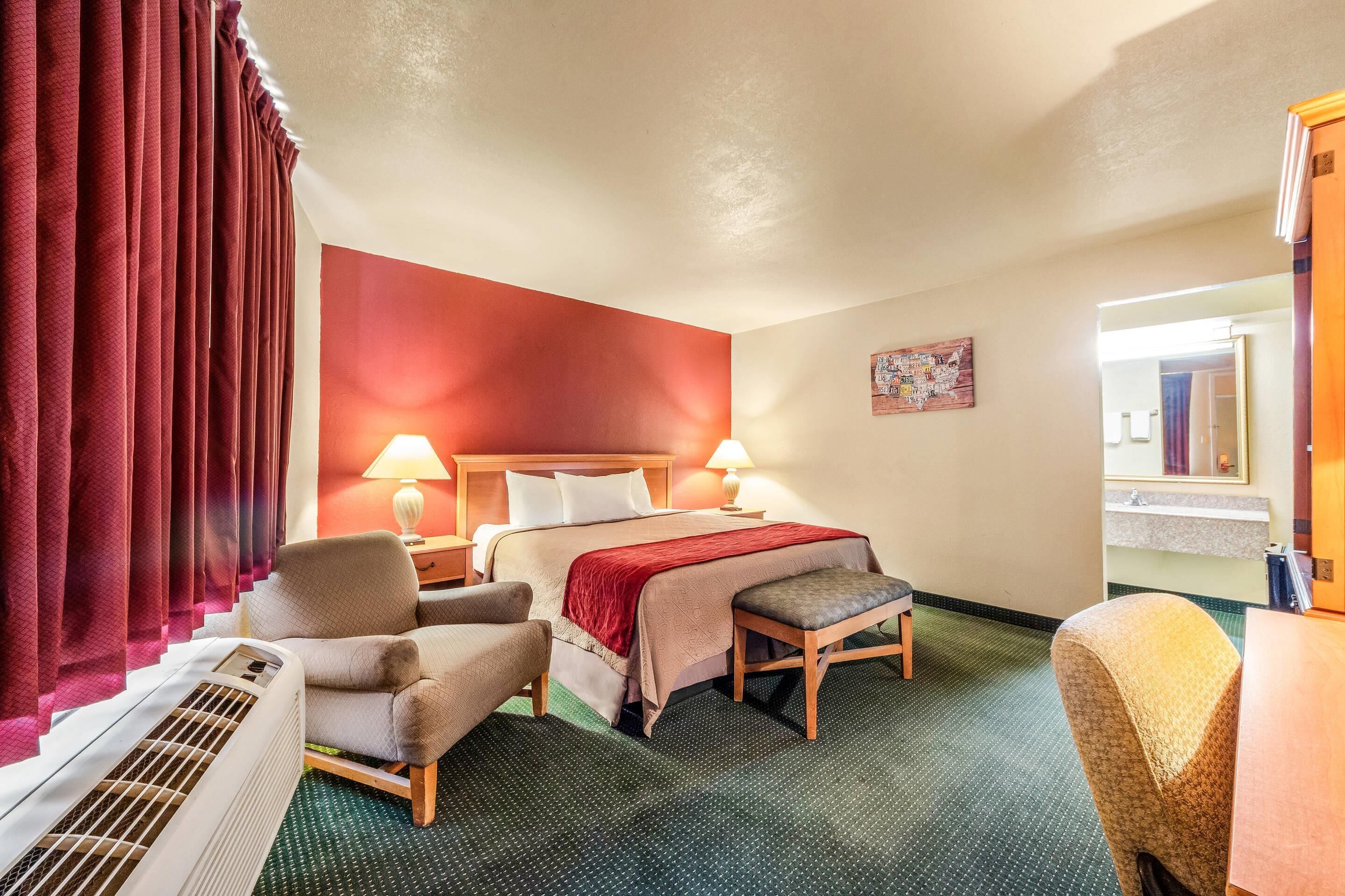 Standard Room, 1 King Bed, Non Smoking (First Floor) | Pillowtop beds, desk, laptop workspace, blackout drapes