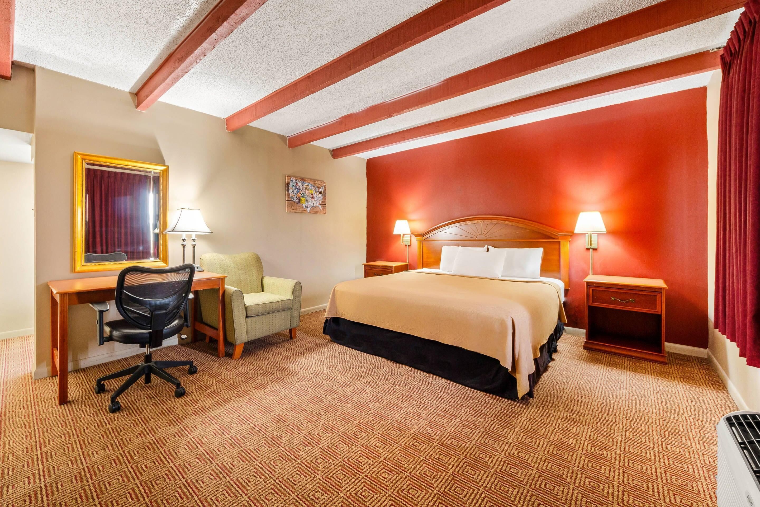 Standard Room, 1 King Bed, Non Smoking | Pillowtop beds, desk, laptop workspace, blackout drapes