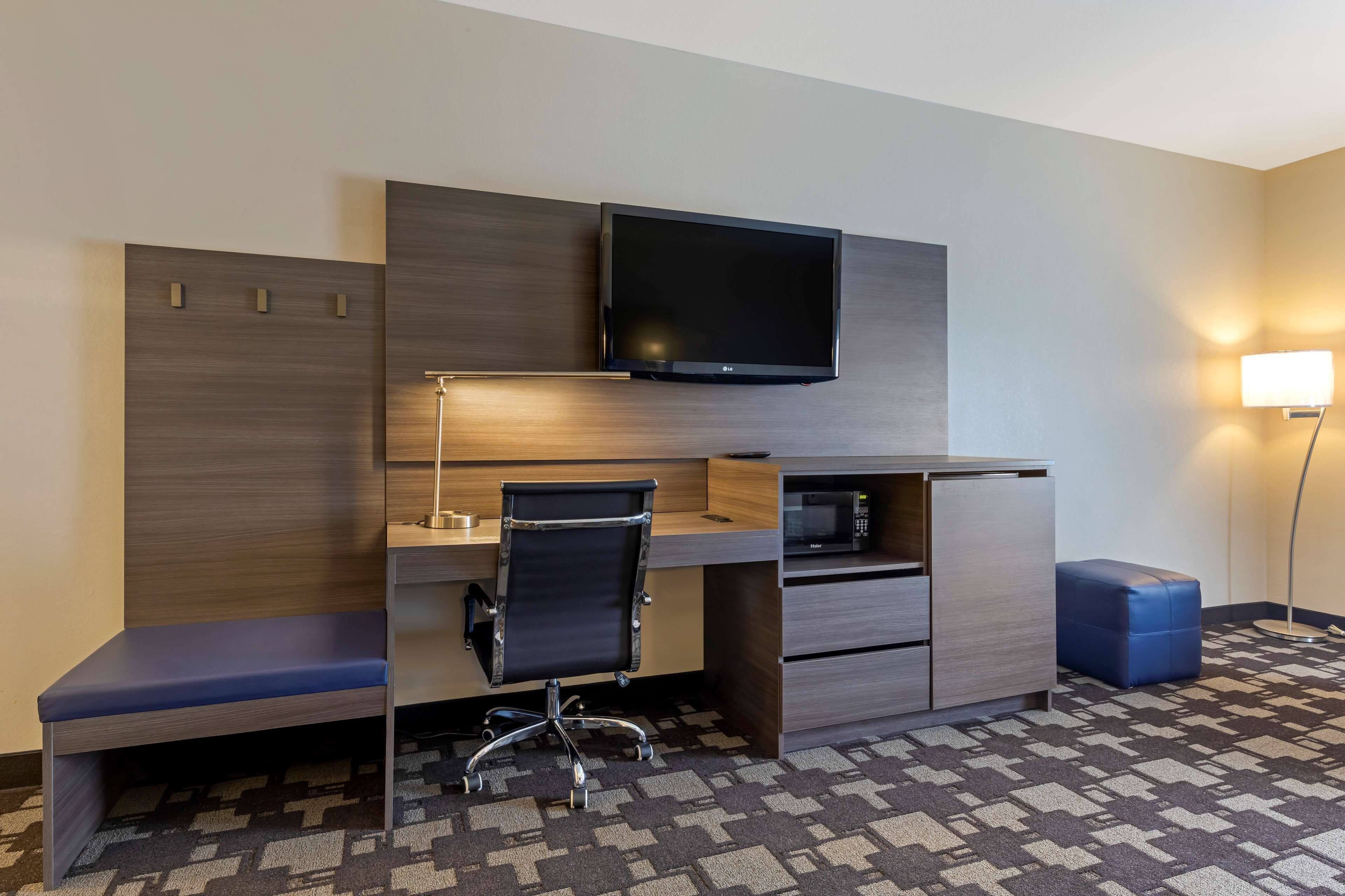 desk, laptop workspace, blackout curtains, iron/ironing board