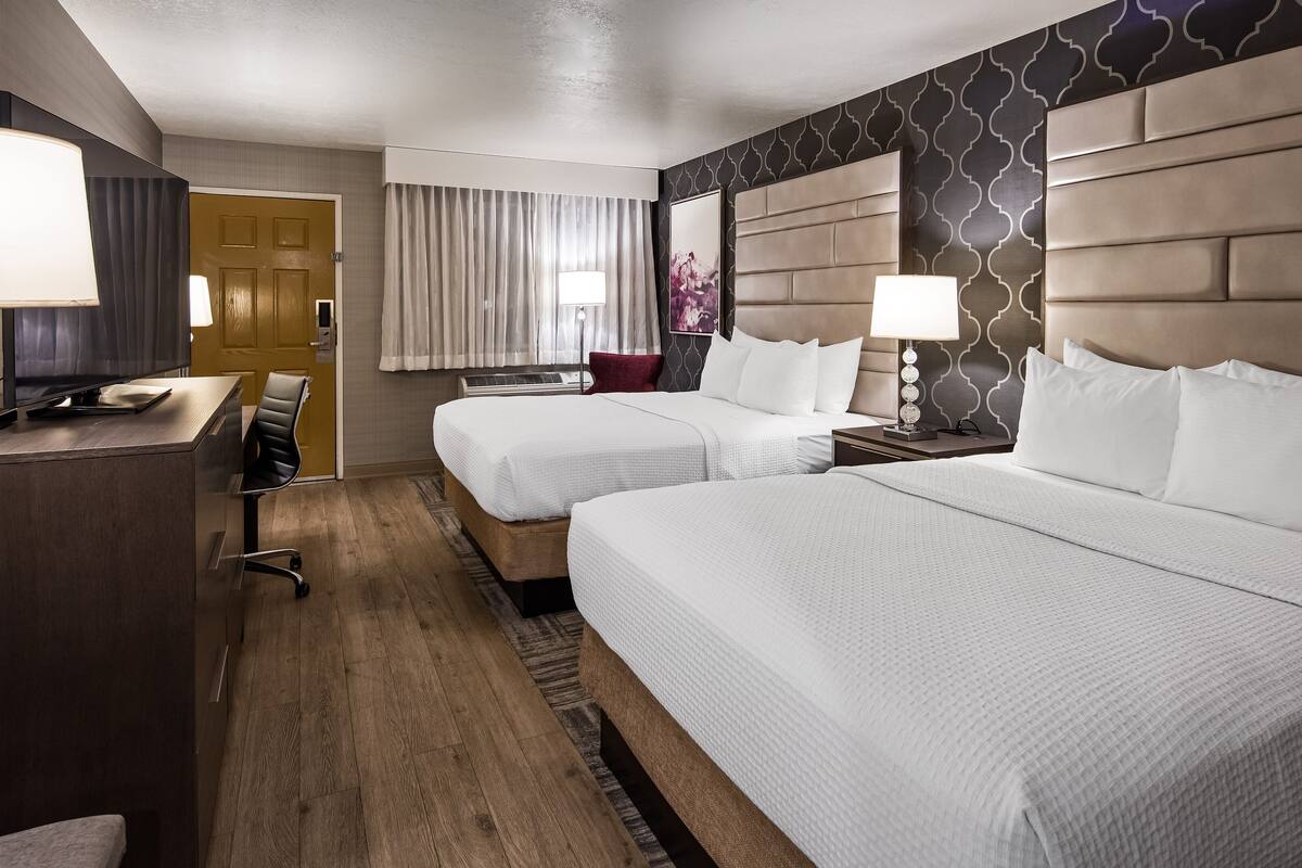 standard two queen beds | premium bedding, desk, blackout curtains, iron/ironing board