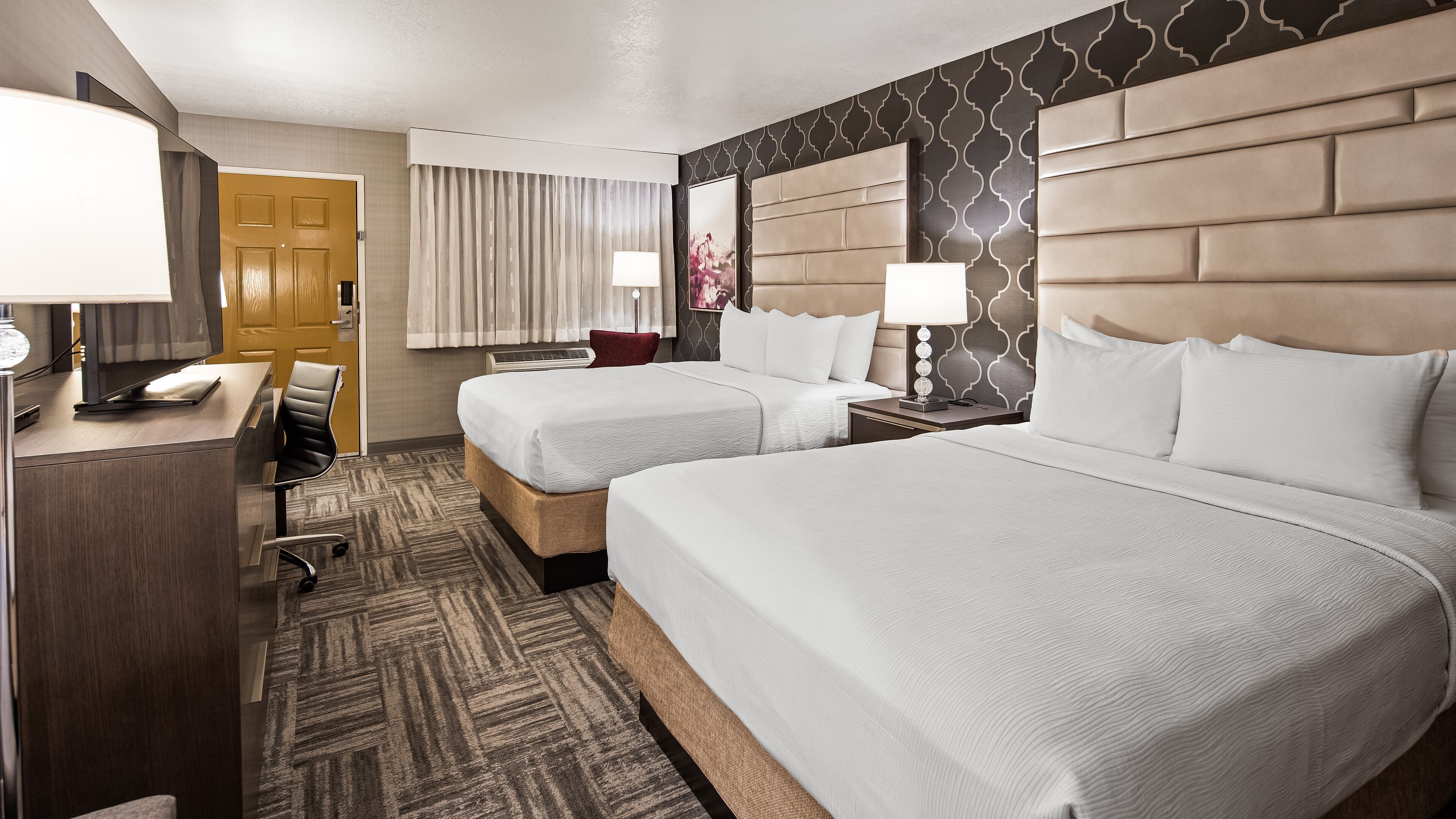 standard two queen beds | premium bedding, desk, blackout curtains, iron/ironing board