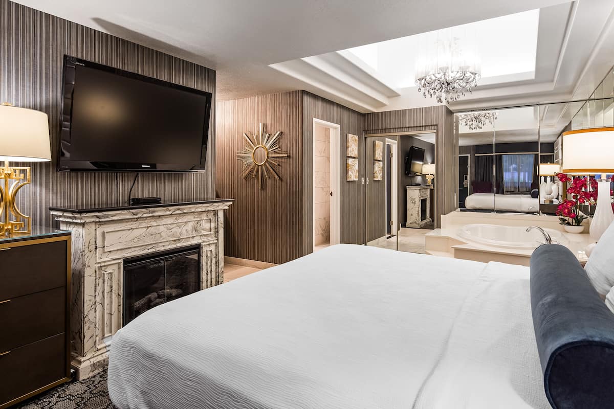 premium bedding, desk, blackout curtains, iron/ironing board