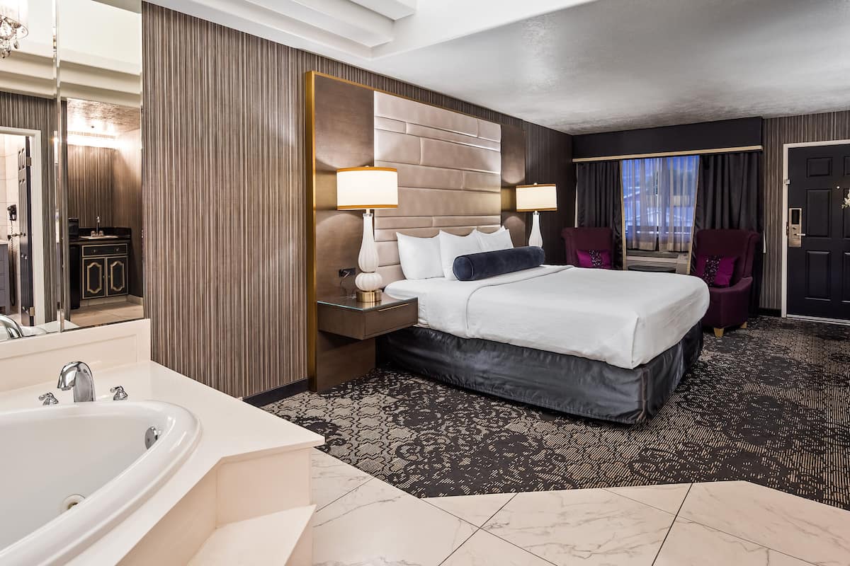 premium bedding, desk, blackout curtains, iron/ironing board