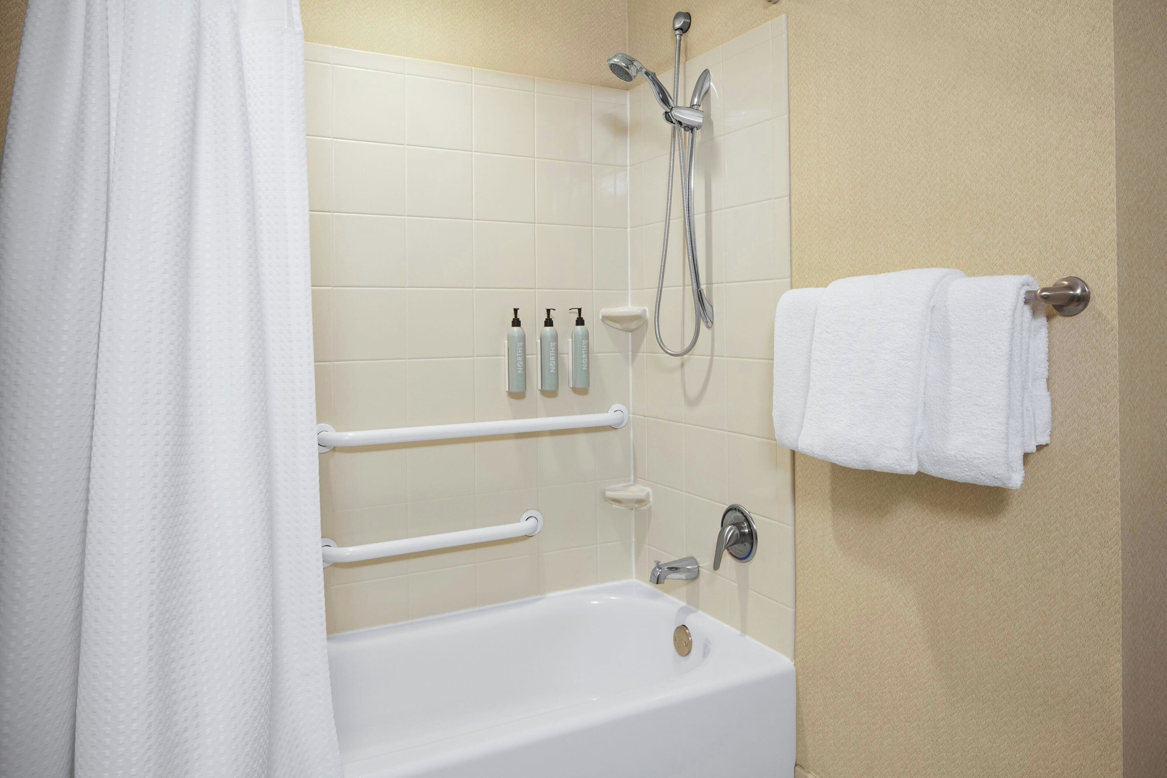 combined shower/bathtub, free toiletries, hair dryer, towels