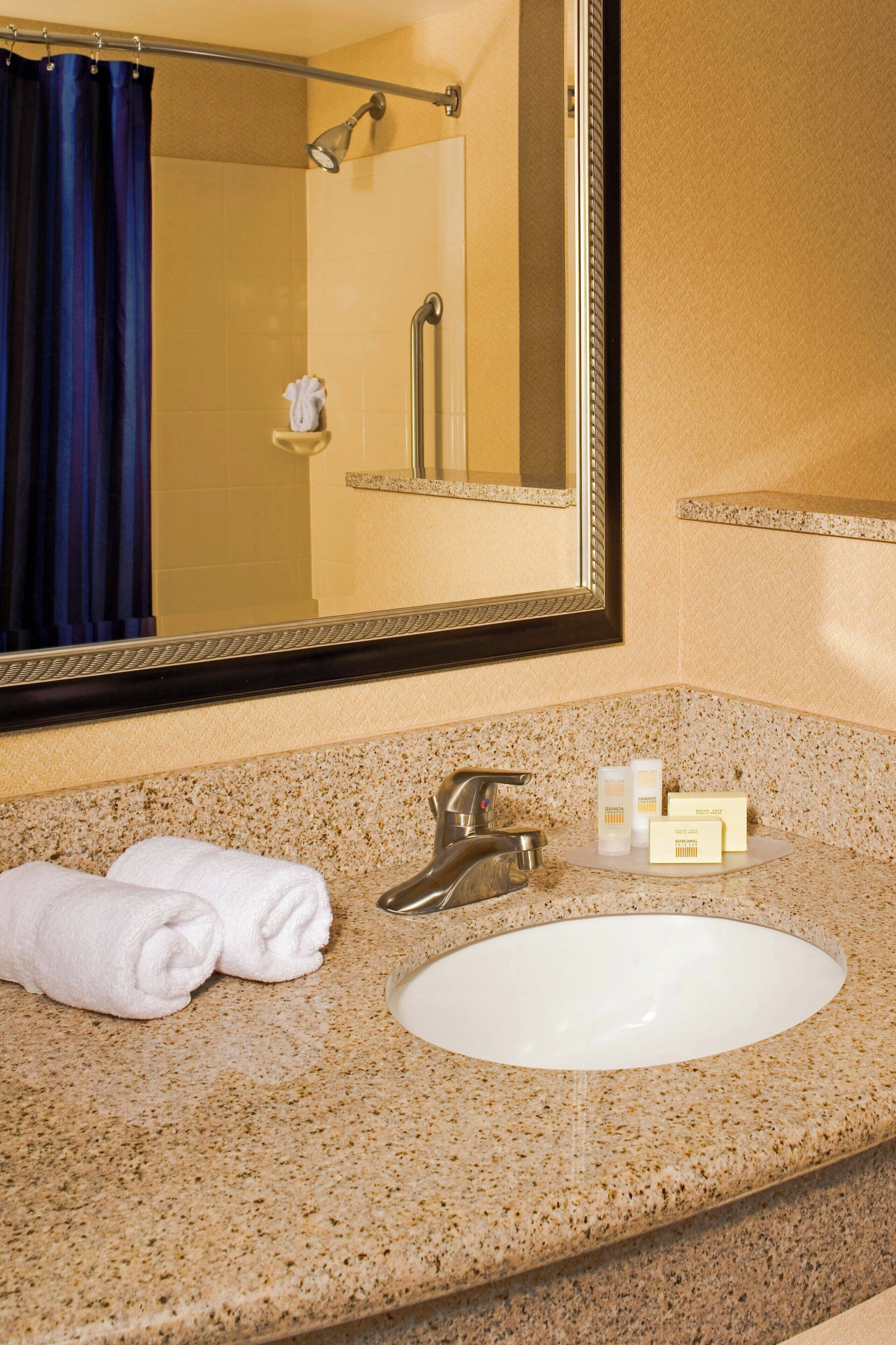 combined shower/bathtub, free toiletries, hair dryer, towels