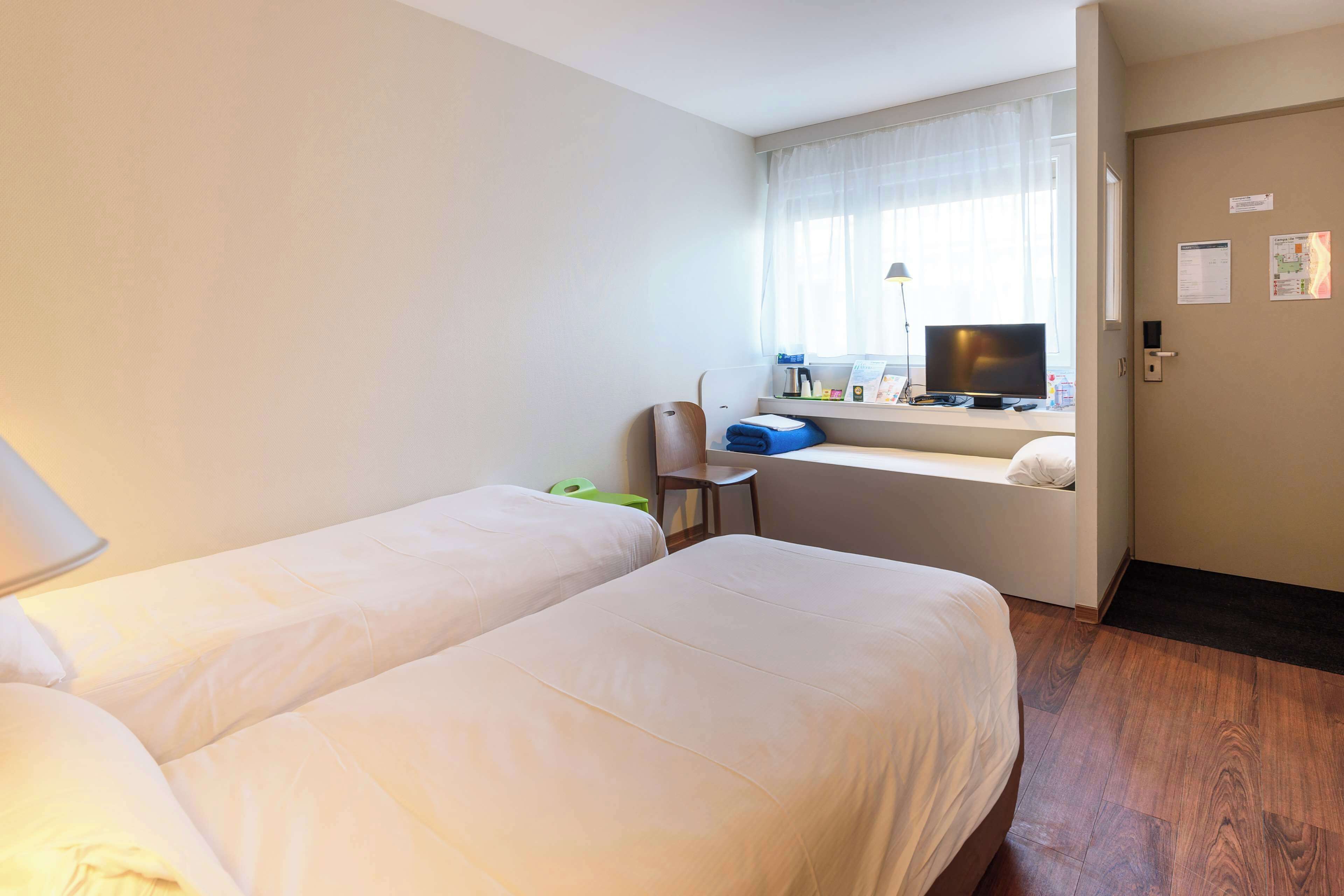 junior room, 2 single beds | premium bedding, pillow-top beds, desk, soundproofing