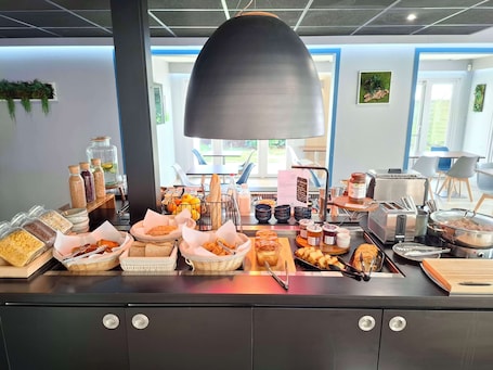 Daily buffet breakfast (EUR 14.9 per person)