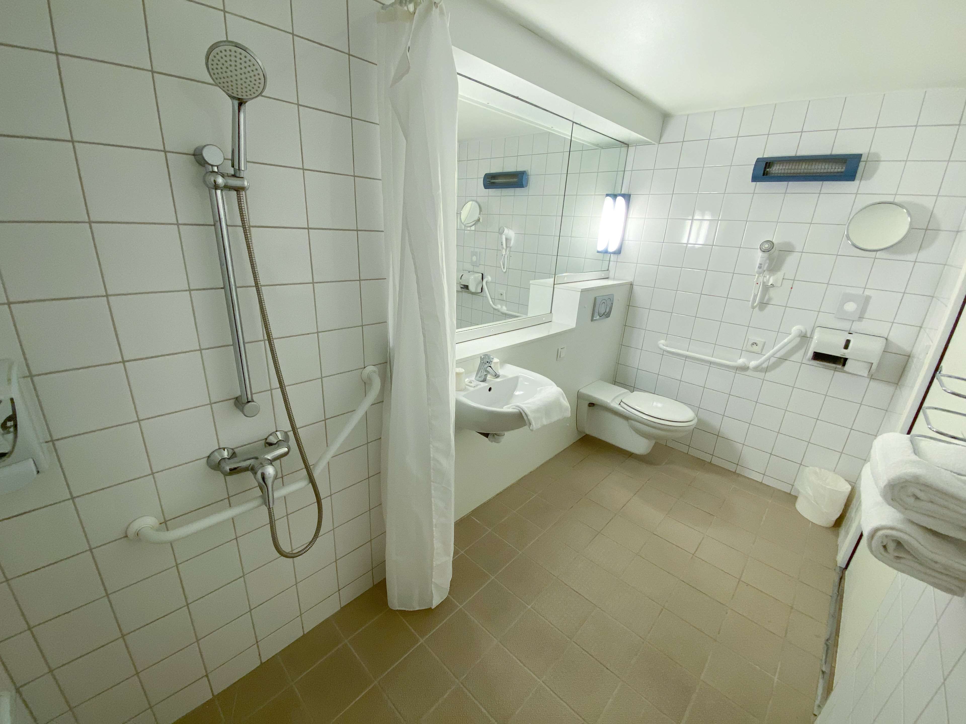 eco-friendly toiletries, hair dryer, towels