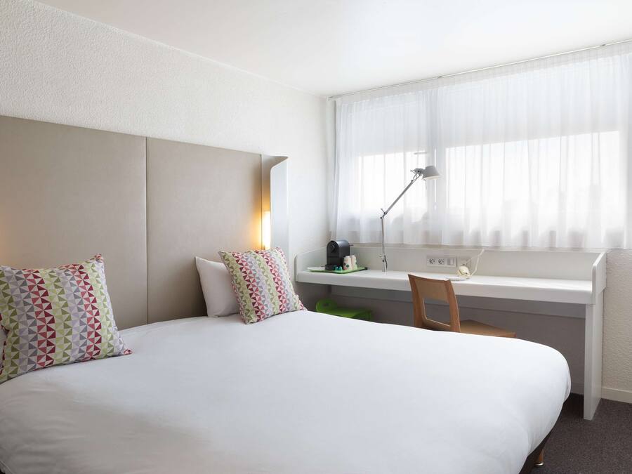 Premium bedding, laptop workspace, soundproofing, iron/ironing board