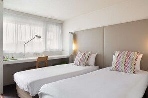 Standardzimmer, 2 Einzelbetten | Hochwertige Bettwaren, laptopgeeigneter Arbeitsplatz