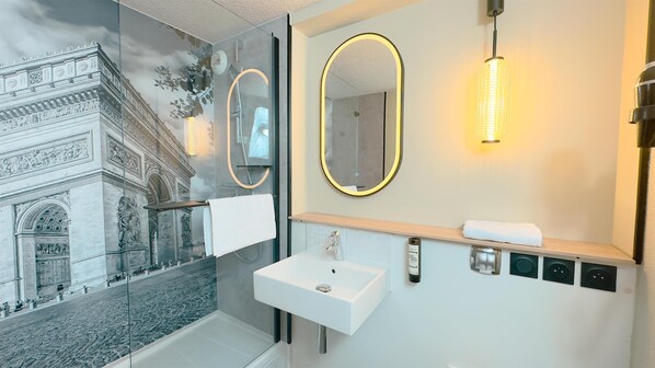 Shower, eco-friendly toiletries, hair dryer, towels