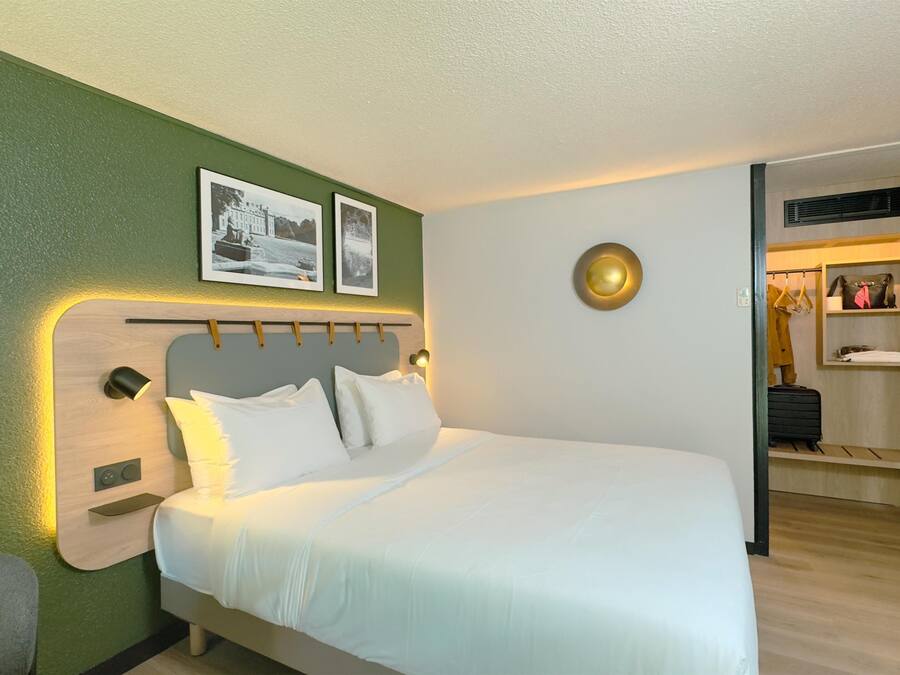 Premium bedding, desk, laptop workspace, soundproofing