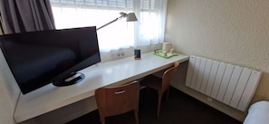 Premium bedding, individually furnished, desk, laptop workspace