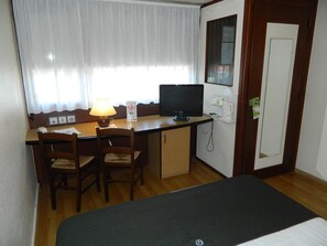 Desk, soundproofing, iron/ironing board, free cribs/infant beds