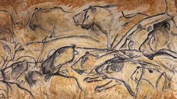 A cave painting of horses.