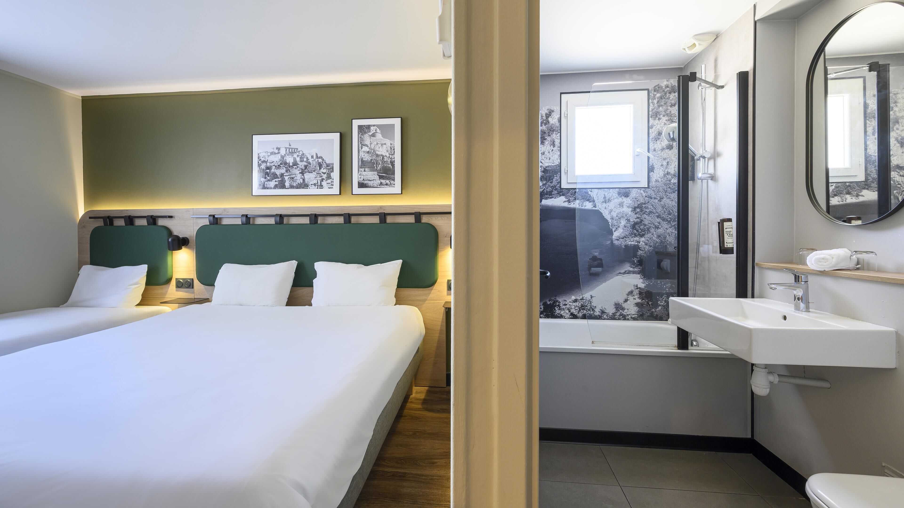 Triple Room, Multiple Beds | Bathroom | Combined shower/tub, eco-friendly toiletries, hair dryer, towels