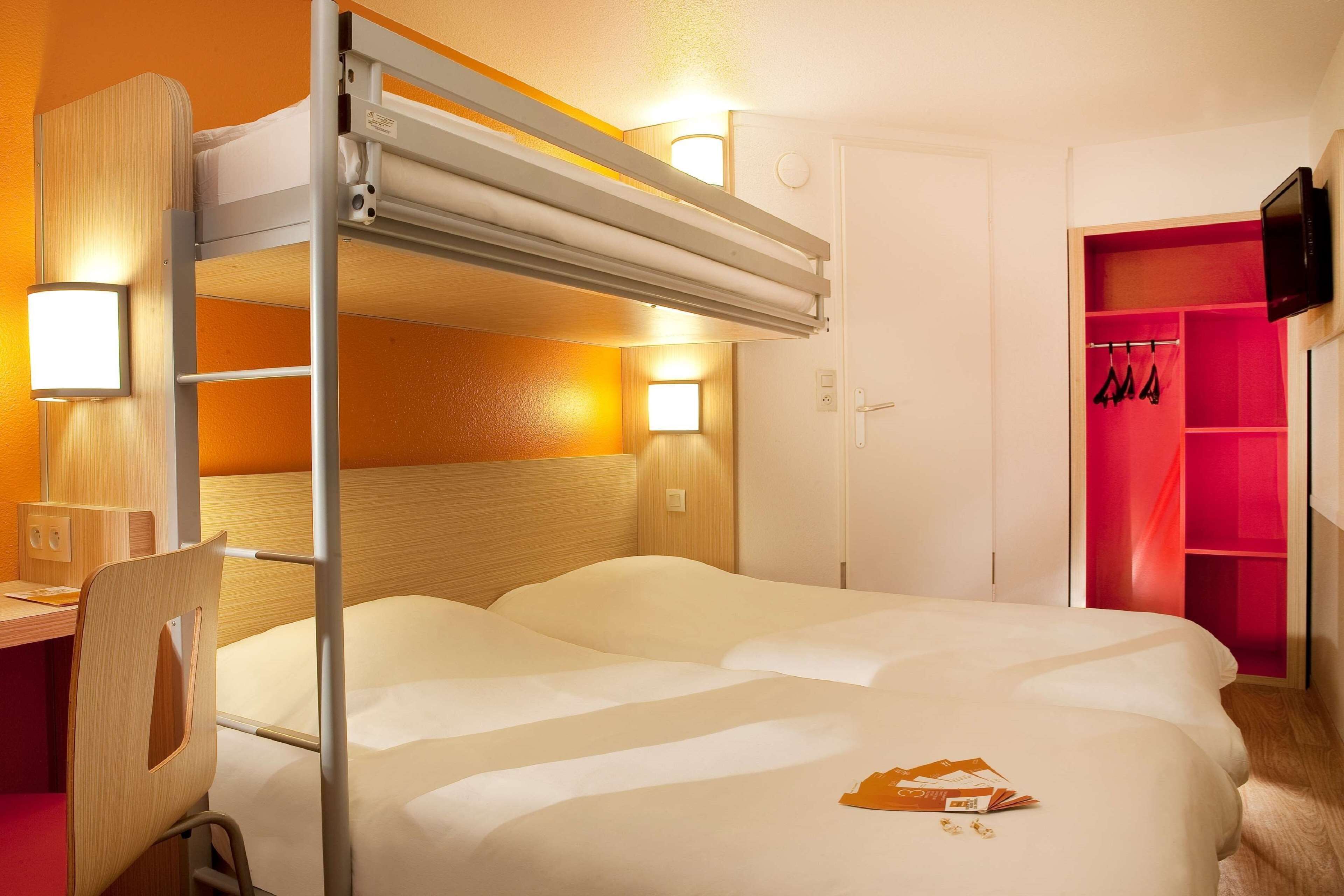 Premium bedding, desk, blackout drapes, iron/ironing board