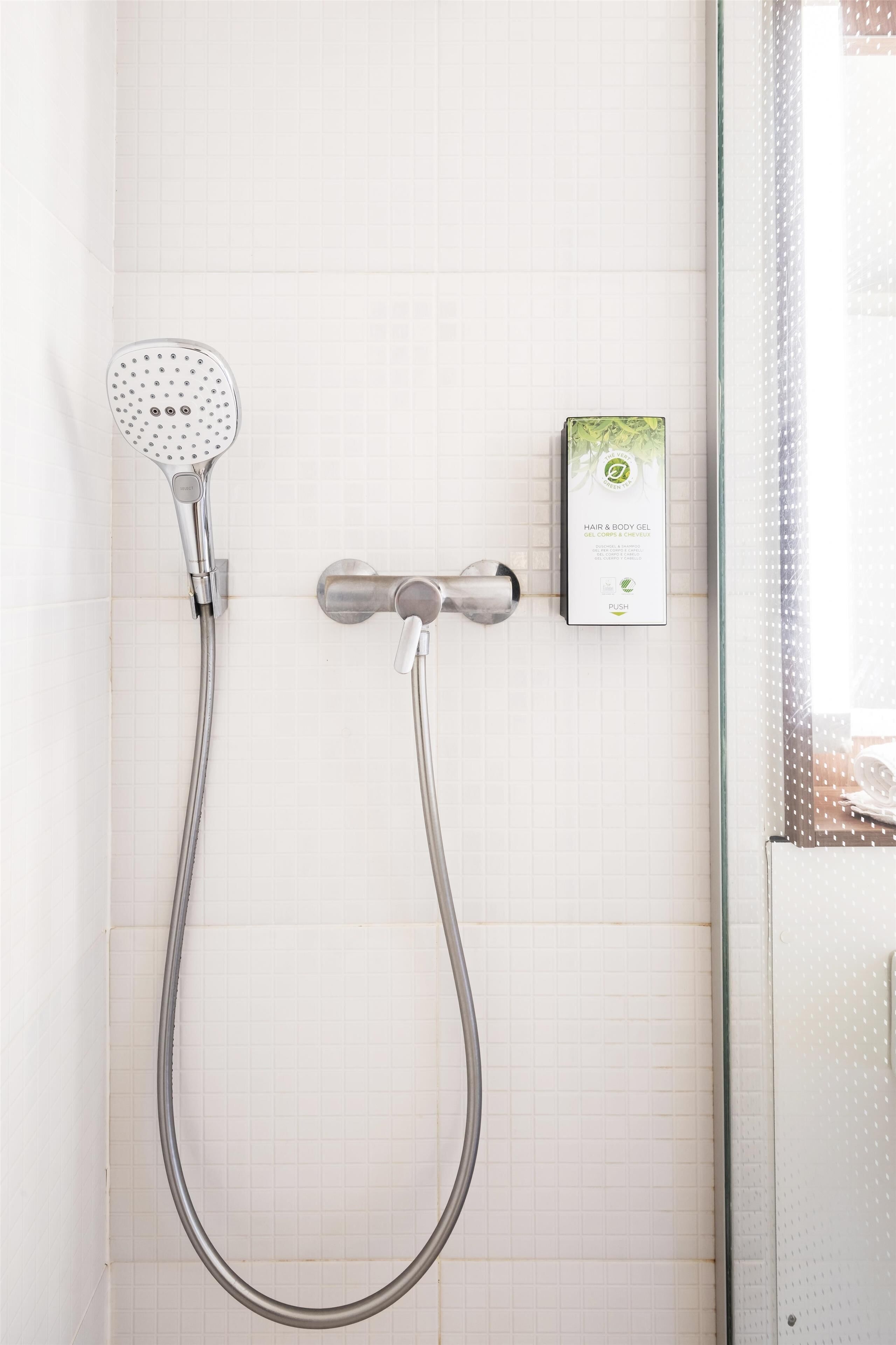 shower, eco-friendly toiletries, hair dryer, towels