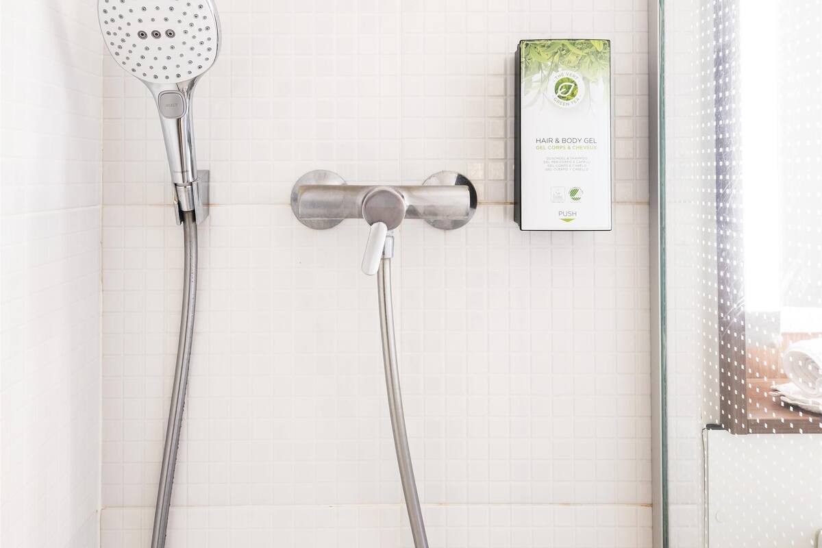shower, eco-friendly toiletries, hair dryer, towels