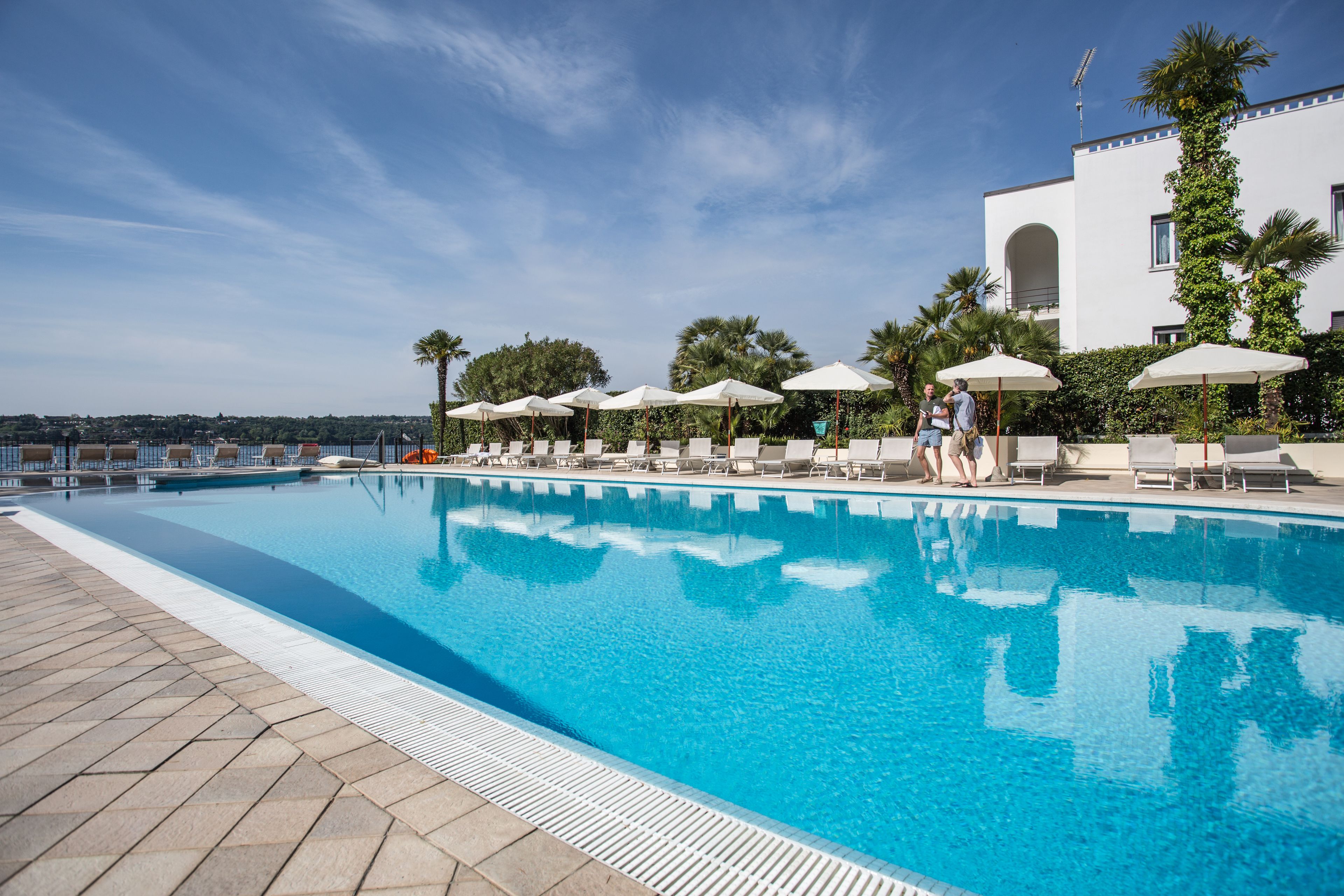 outdoor pool, pool umbrellas, pool loungers