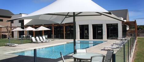 Outdoor pool, pool umbrellas, sun loungers