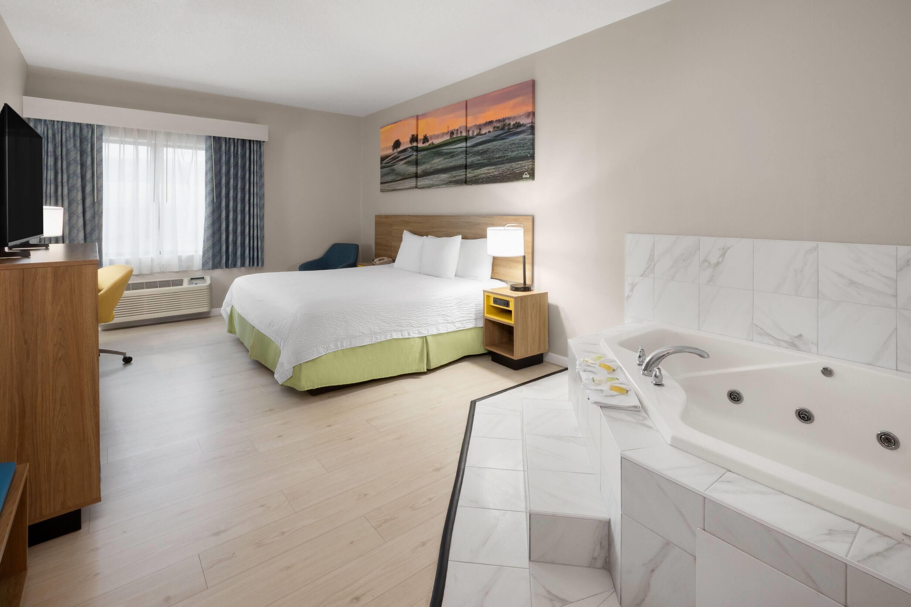 Quarto luxo, 1 cama King, para não fumantes | Banheira de hidromassagem