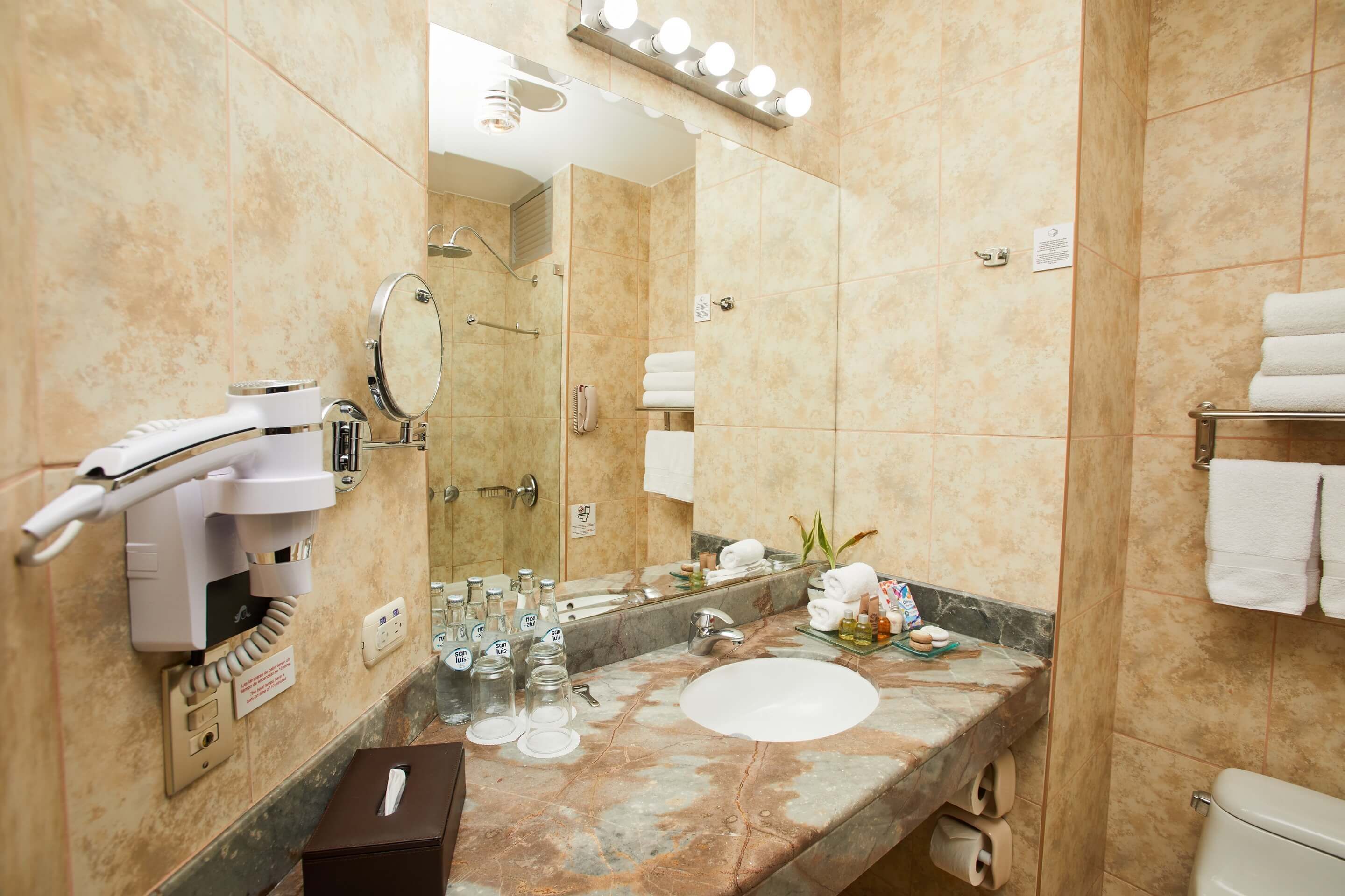 superior triple room | bathroom | combined shower/bathtub, rainfall showerhead, free toiletries
