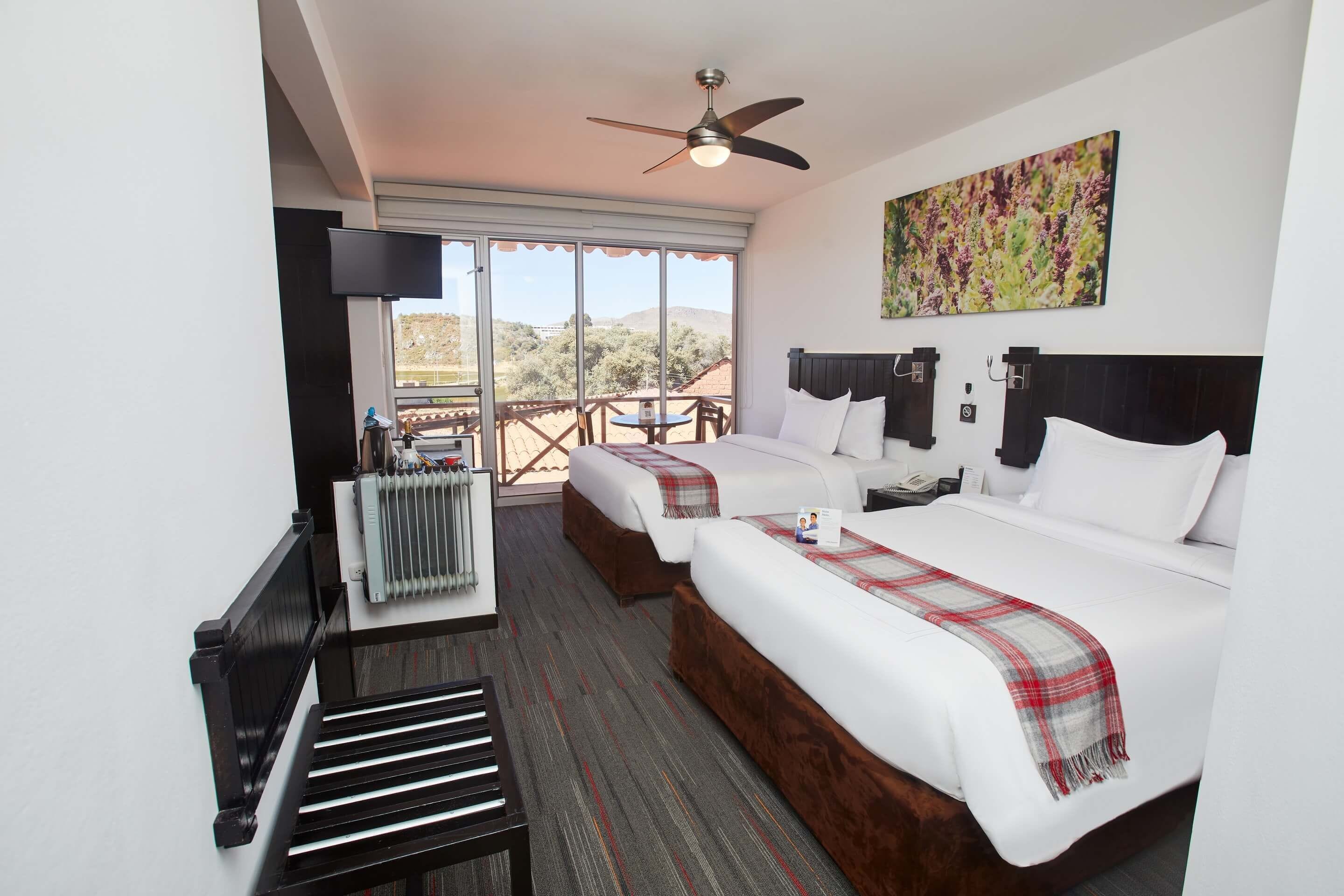 superior triple room | minibar, in-room safe, desk, soundproofing