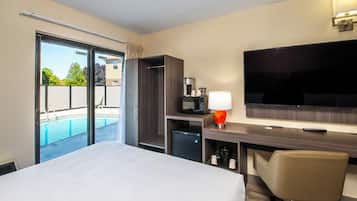 Desk, laptop workspace, blackout curtains, iron/ironing board