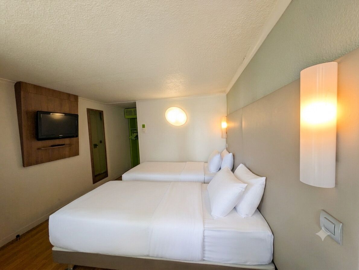 Premium bedding, desk, laptop workspace, blackout curtains