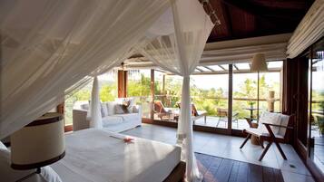 Bangalô premium | Roupas de cama premium, camas com colchões pillow-top, frigobar