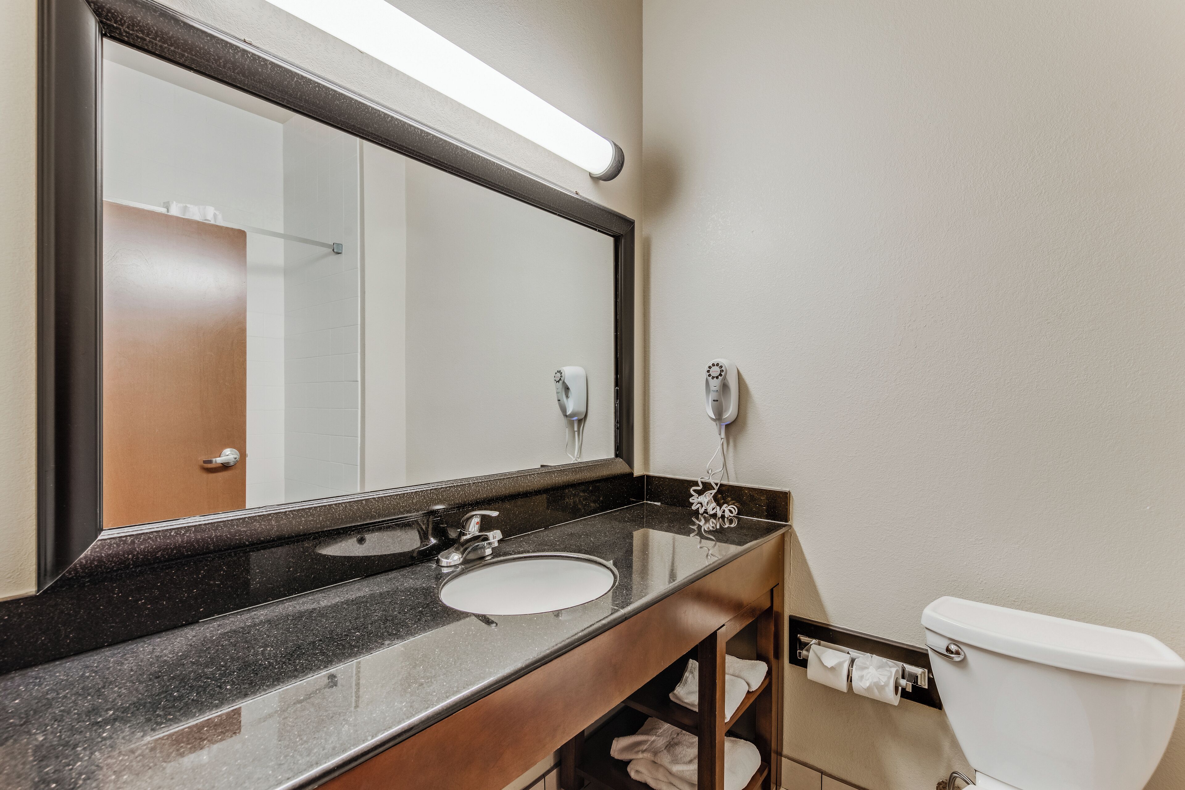 suite, 1 king bed with sofa bed, non smoking | bathroom | combined shower/bathtub, free toiletries, hair dryer, towels