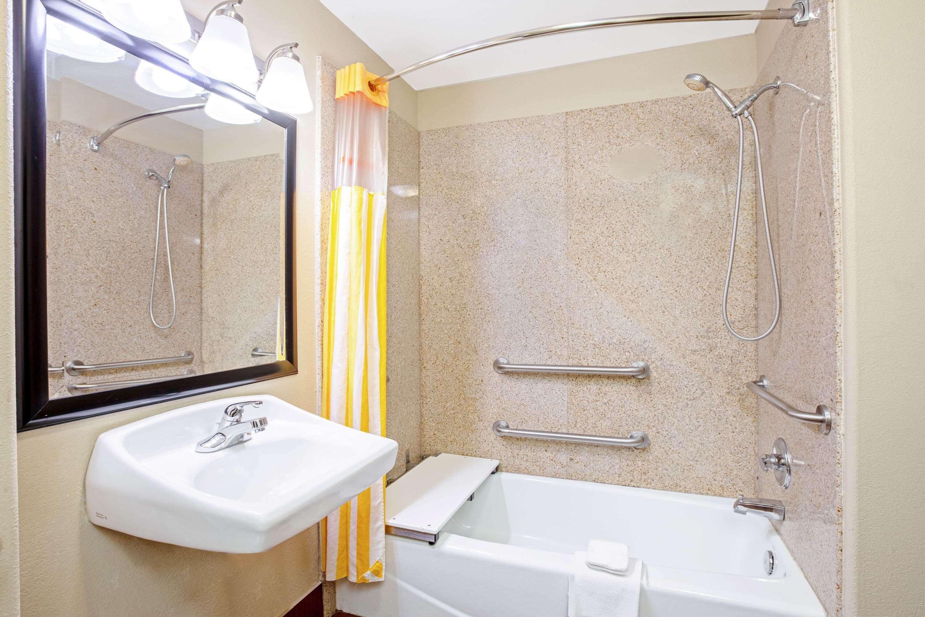 bathtub, free toiletries, hair dryer, towels