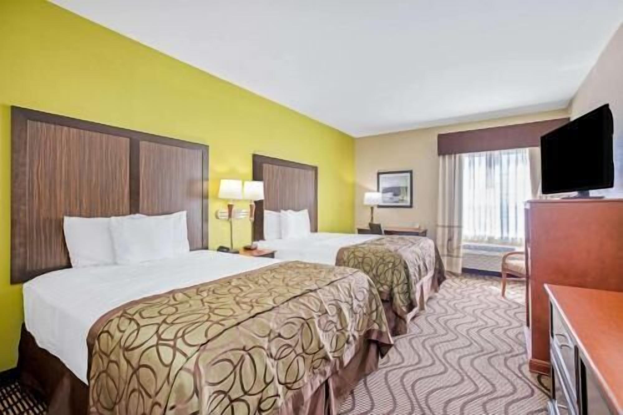 Premium bedding, desk, blackout drapes, iron/ironing board