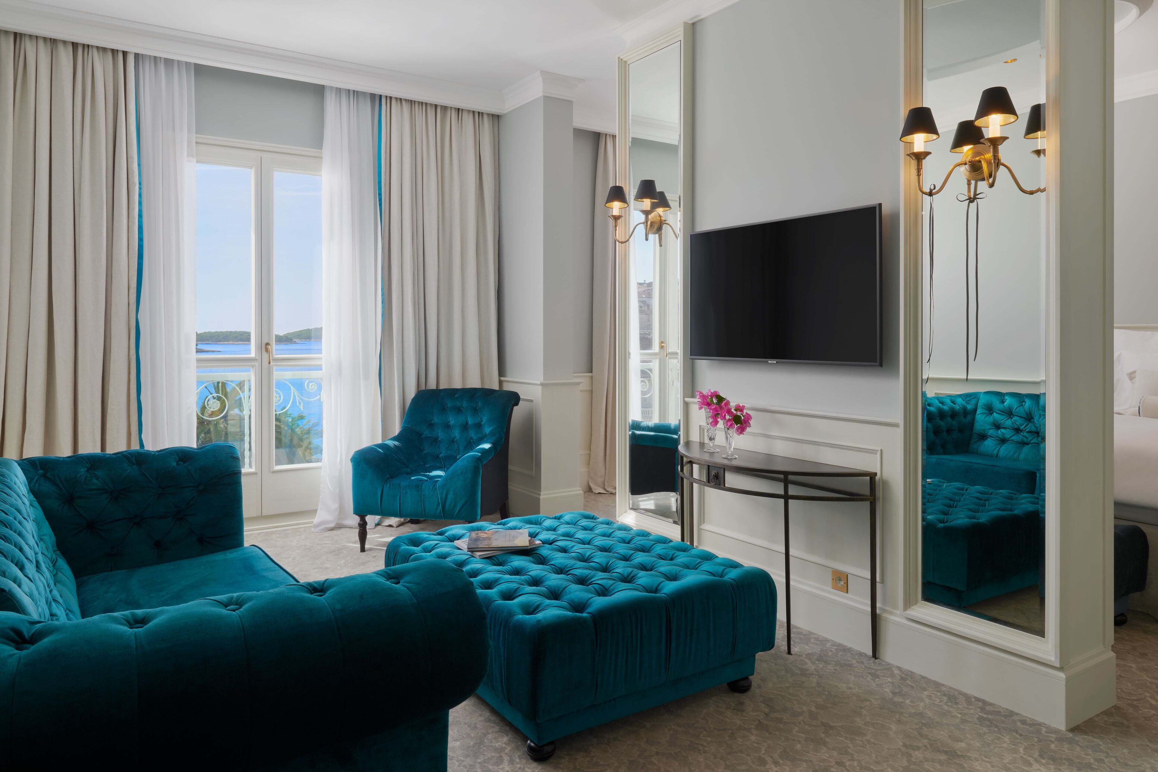 deluxe suite, sea view | living room | 49-inch lcd tv with digital channels, tv