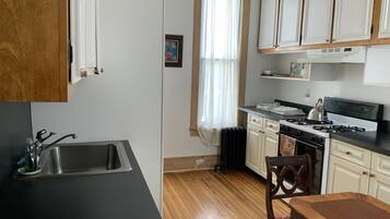 Classic Suite, 1 King Bed | Private kitchen | Fridge, dining tables