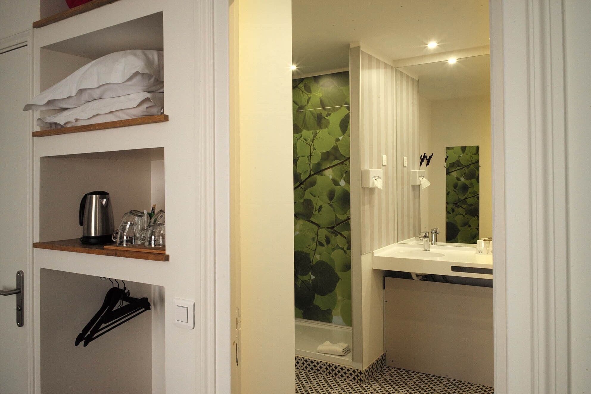 shower, free toiletries, hair dryer, towels