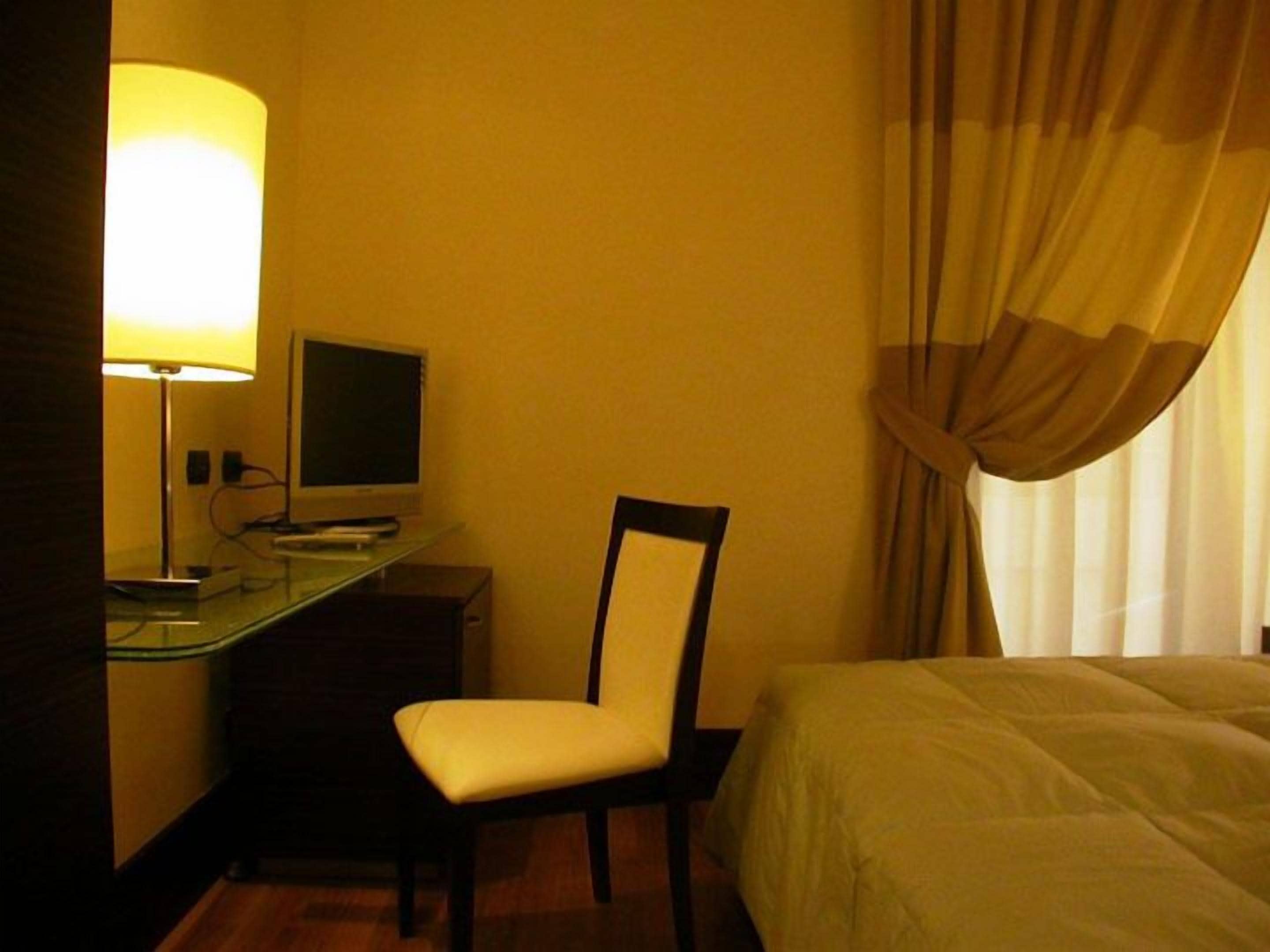 Foto - The Strand Hotel