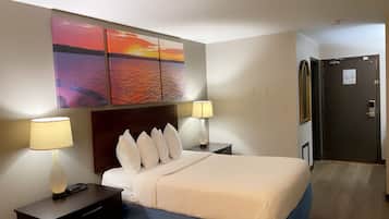 Desk, laptop workspace, iron/ironing board, free cribs/infant beds