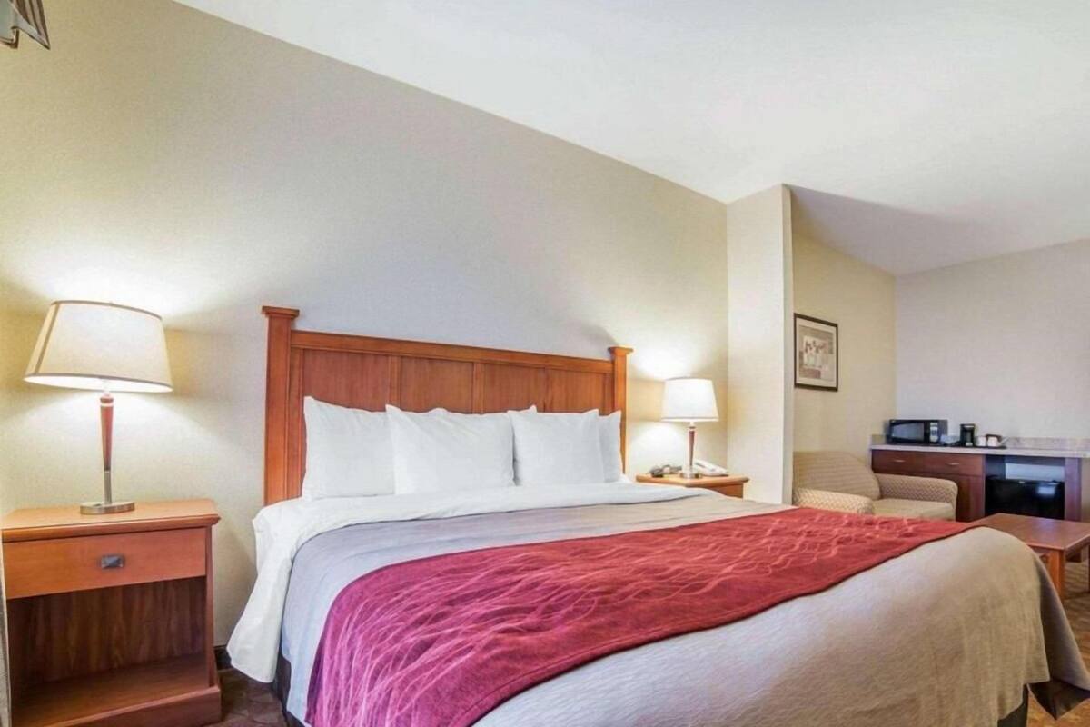 Premium bedding, blackout drapes, iron/ironing board, rollaway beds