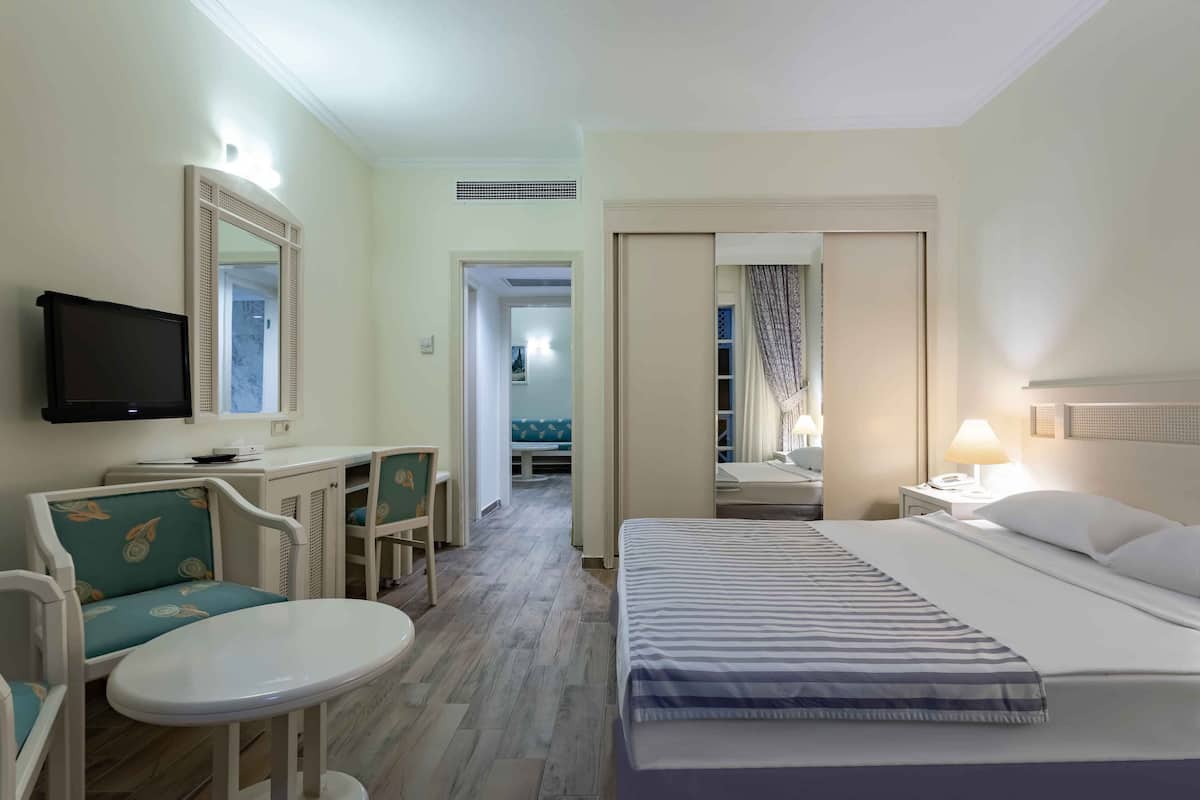 2 habitaciones, minibar y caja de seguridad en la habitación