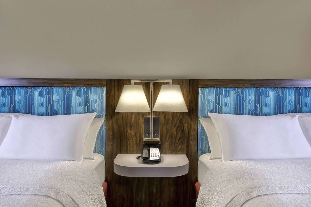 premium bedding, desk, blackout curtains, iron/ironing board