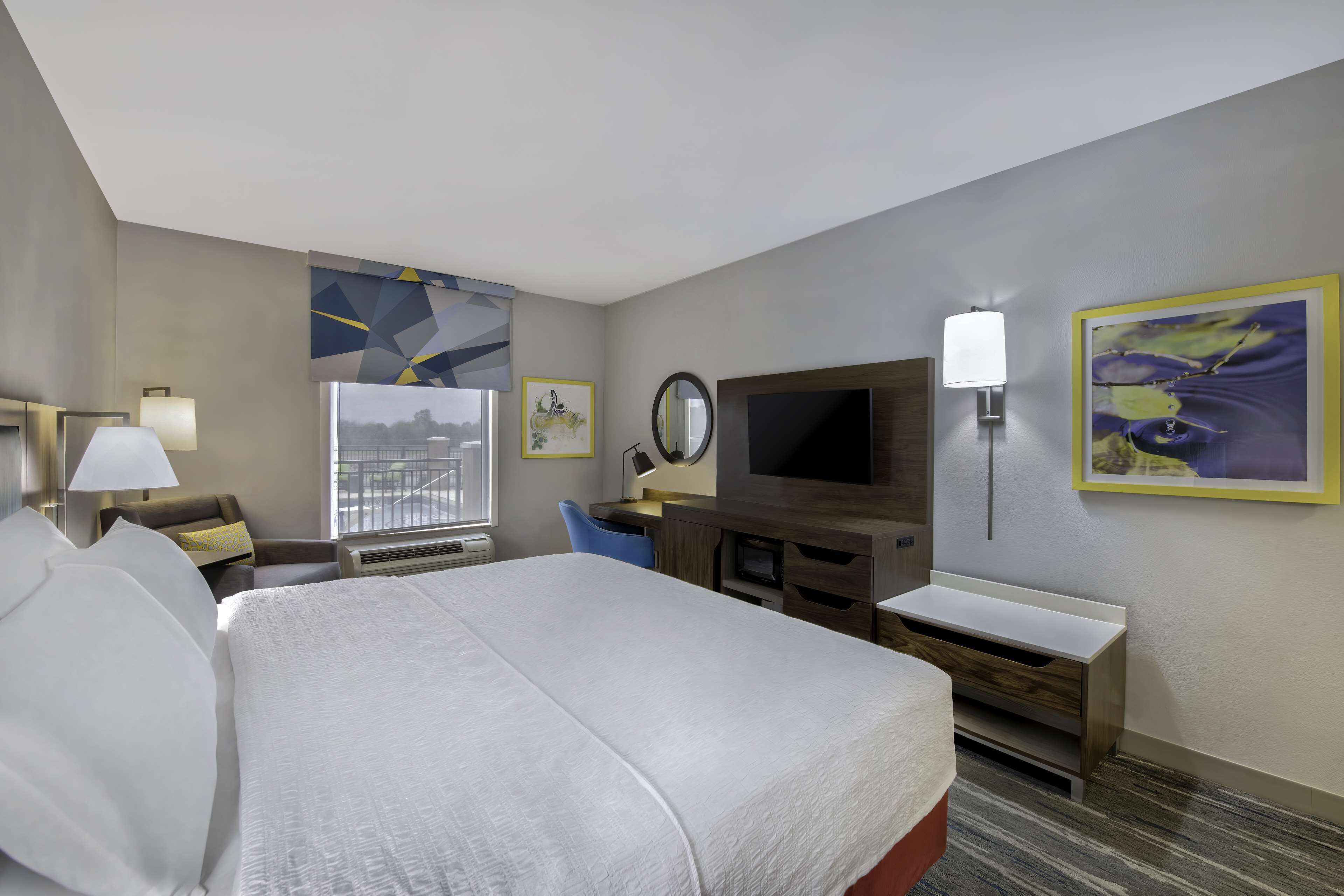 premium bedding, desk, blackout curtains, iron/ironing board