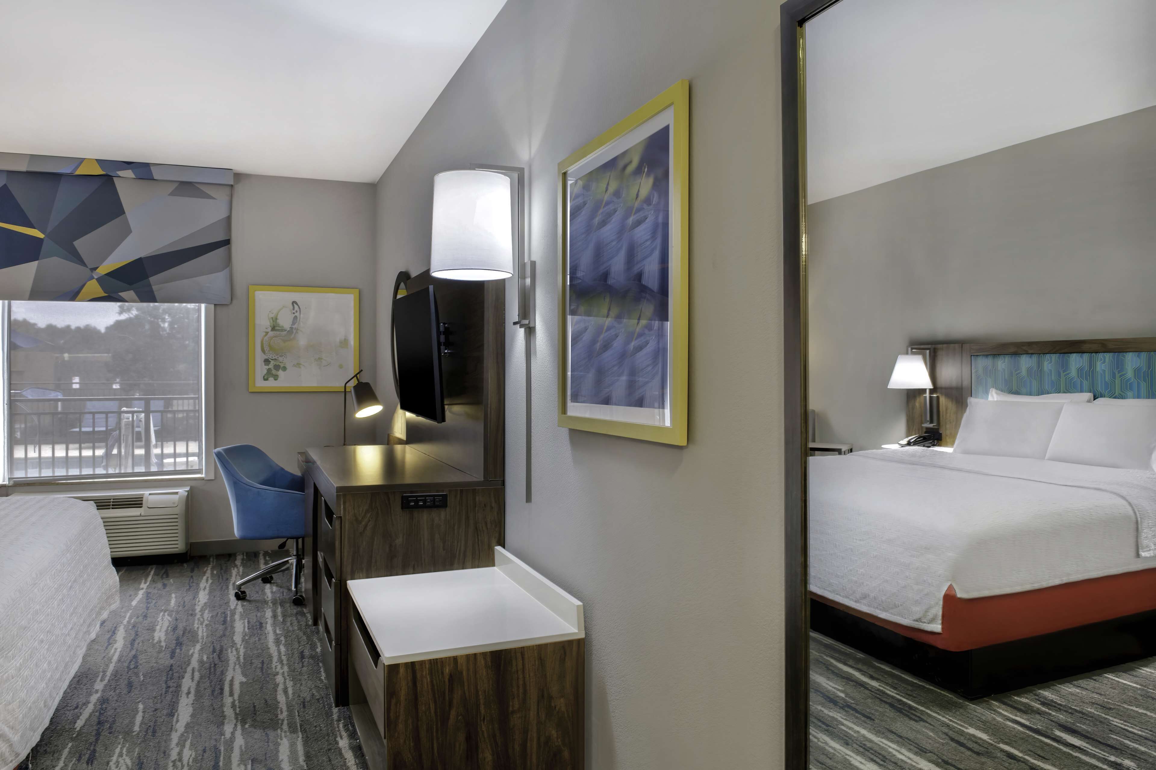 premium bedding, desk, blackout curtains, iron/ironing board