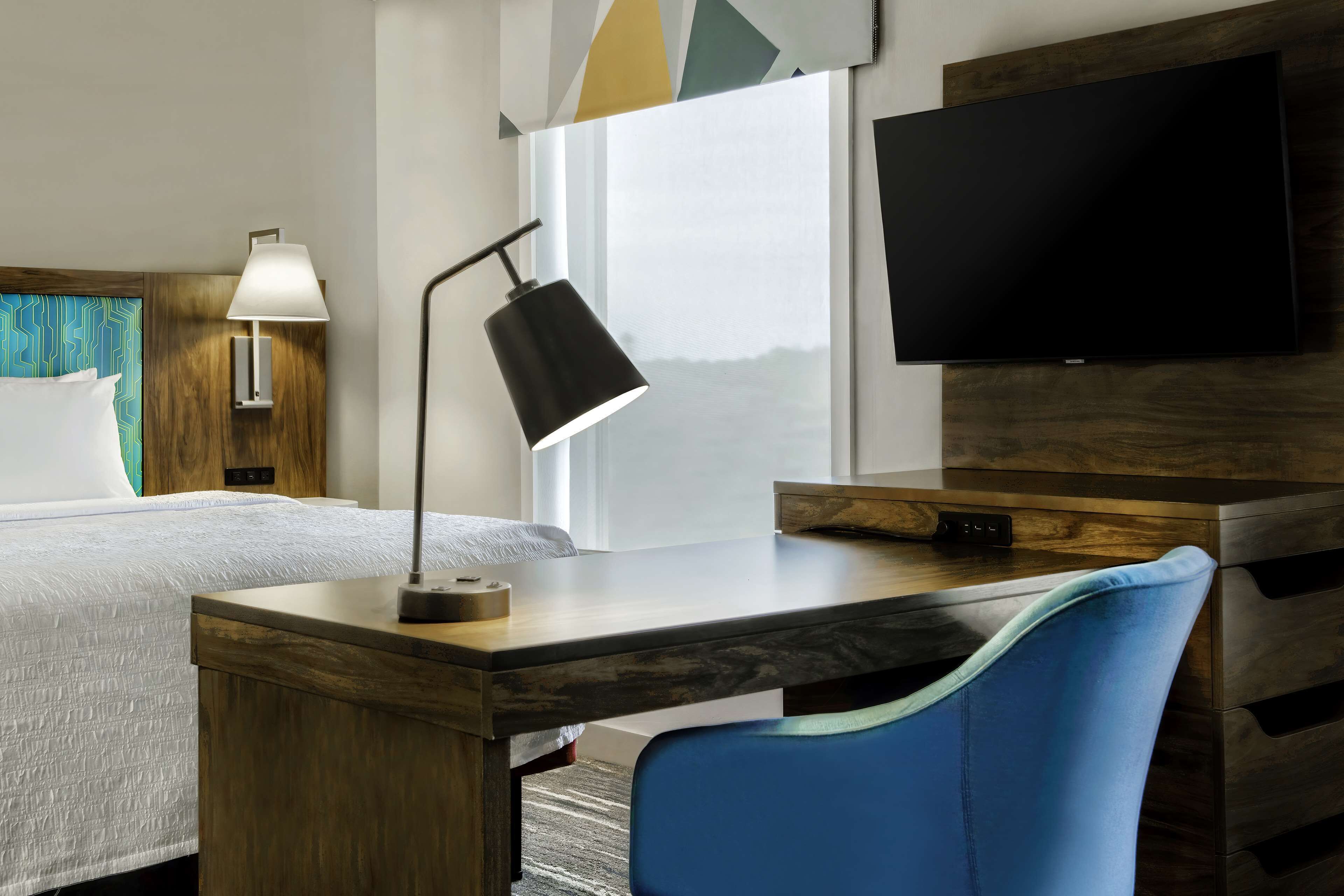 premium bedding, desk, blackout curtains, iron/ironing board